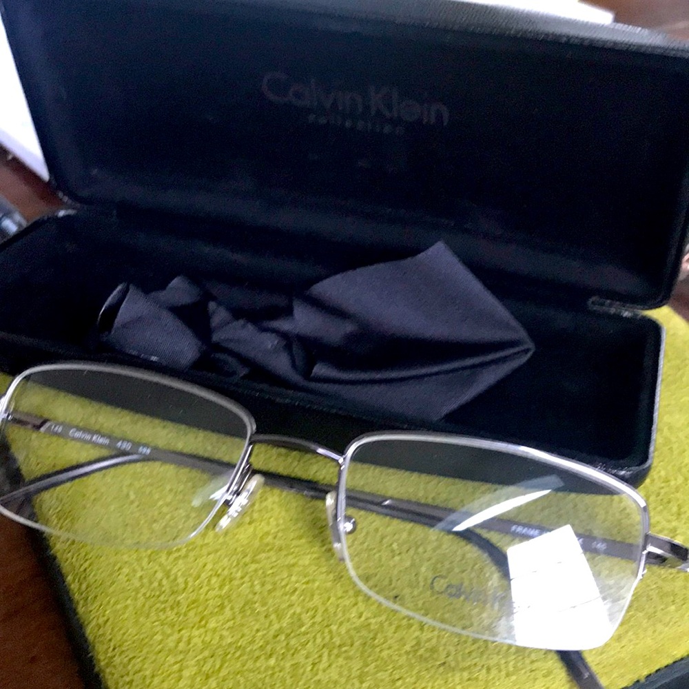 Calvin Klein 430 Never owned Shiny silver glasses